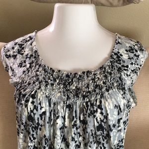 Stretch tank. 100% rayon. Fun print!